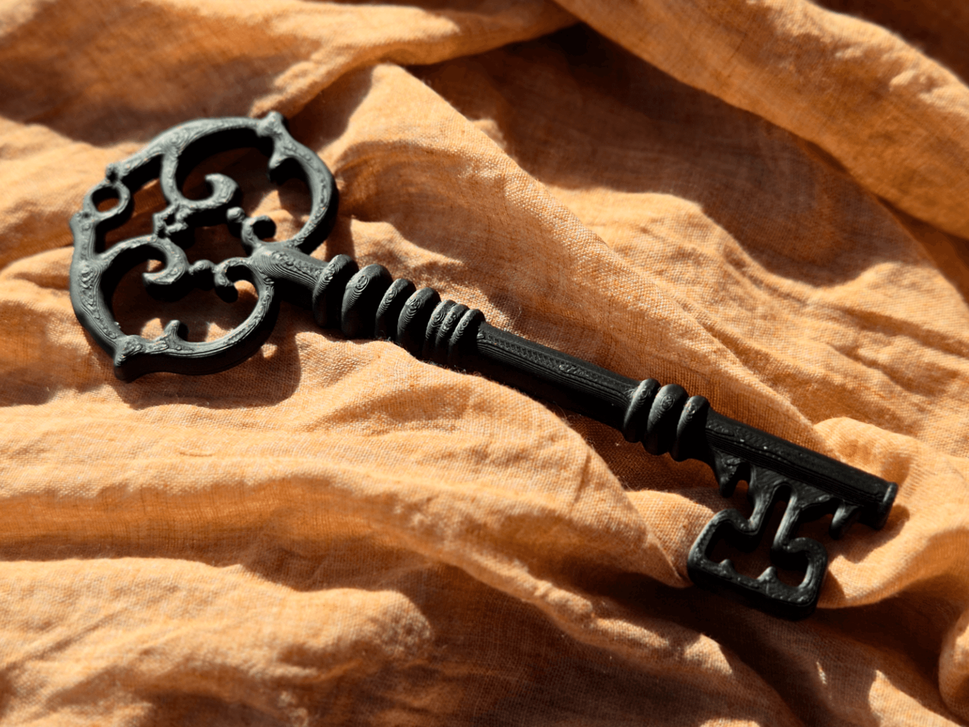 Cas-printed Ancient Key Bookshelf Decor, photographed in the studio.